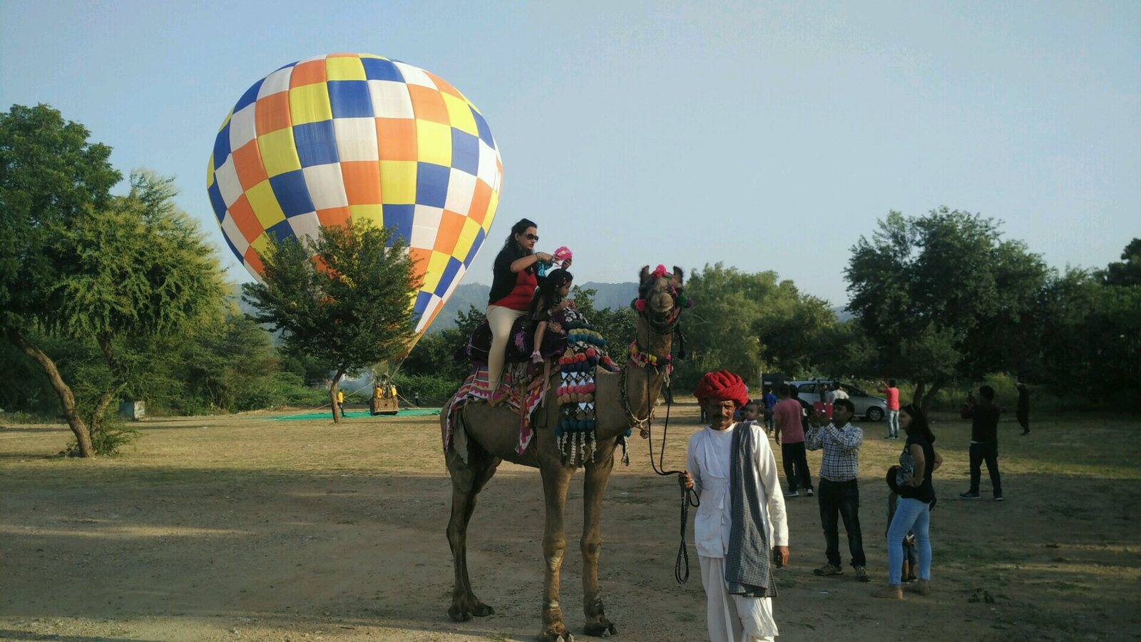 Hot air balloon and camel experience at a Ranakpur festival